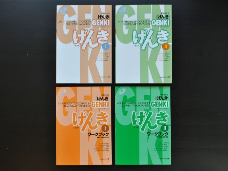 Volumes 1, and 2 of the Genki Japanese language textbook, and workbook series